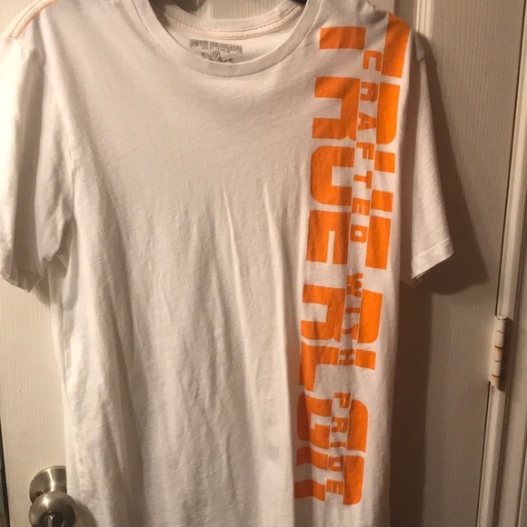 white and orange true religion shirt
